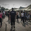 Người Việt nhập cưu bất hợp pháp bị đưa tới một khu trại ở Đông Moskva tháng 9/2013 (Nguồn: AFP)