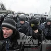 Theo luật chống biểu tình mới, nhà chức trách Ukraine sẽ phạt tù lên tới 5 năm đối với những đối tượng phong tỏa các tòa nhà công quyền. (Nguồn: AFP/TTXVN)