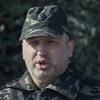Quyền Tổng thống Ukraine Oleksander Turchinov mặc trang phục dã chiến (Nguồn: Al Jazerra)