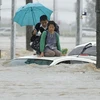 [Photo] Mưa lũ kinh hoàng ở Nhật cuốn trôi nhiều nhà cửa