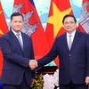 Thủ tướng Phạm Minh Chính và Thủ tướng Campuchia Samdech Hun Manet tại hội đàm. (Ảnh: Dương Giang/TTXVN) 