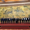Bộ trưởng Ngoại giao Trung Quốc Vương Nghị cùng các đại diện Palestine trong cuộc họp ở Bắc Kinh (Ảnh: GCTN)