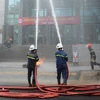 Lực lượng Cảnh sát Phòng cháy, chữa cháy diễn tập tại Đà Nẵng. (Ảnh: Văn Dũng/TTXVN)