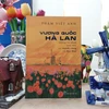Sách dày 200 trang, là ấn phẩm kỷ niệm 50 năm thiết lập quan hệ ngoại giao Việt Nam-Hà Lan. (Ảnh: Minh Thu/Vietnam+)