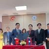 Ngành Văn thư-Lưu trữ Việt Nam và Lào ký kết hợp tác trong năm 2024. (Ảnh: Minh Thu/Vietnam+)
