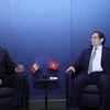 Thủ tướng Phạm Minh Chính gặp Tổng thống Romania Klaus Iohannis tại Trụ sở Liên hợp quốc ở New York (Hoa Kỳ). (Ảnh: Dương Giang/TTXVN) 