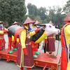 Nghi lễ ''Tiến Xuân ngưu'' được tái hiện tại Hoàng Thành Thăng Long. (Ảnh: PV/Vietnam+)