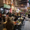 Tối ngày 23/12, Khu phố ẩm thực-đi bộ Đảo Ngọc-Ngũ Xã tại quận Ba Đình (Hà Nội) đã bắt đầu đi vào hoạt động. (Ảnh: Minh Anh/Vietnam+)