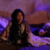 Nghệ sỹ Trà My trong vai bà Thanh Đề sau khi bị đày xuống địa ngục. (Ảnh: PV/Vietnam+)