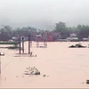 Mưa lớn cộng với việc các hồ thủy điện xả lũ khiến nhiều địa phương của tỉnh Quảng Nam bị ngập nặng trong ngày 16/11/2013 (Ảnh: TTXVN)