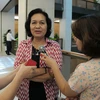 Đại biểu Quốc hội Nguyễn Thị Khá, đoàn Trà Vinh đang trả lời báo chí (Ảnh: Vietnam+)