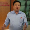 Bộ trưởng Bộ Giao Thông Vận tải Đinh La Thăng đang trao đổi với báo chí (Ảnh: Đức Duy/Vietnam+)