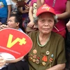Bà Trần Thị Ngờ, người nữ du kích Hoàng Ngân năm xưa trong buổi lễ Quốc khánh 2/9 (Ảnh: PV/Vietnam+)