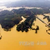Lũ lụt nghiêm trọng tại "rốn lũ" Hương Khê, tỉnh Hà Tĩnh nhìn từ trên cao. (Ảnh: TTXVN)