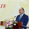 Thủ tướng Nguyễn Xuân Phúc phát biểu ý kiến tại Hội nghị Chính phủ với địa phương ngày 2/7. (Ảnh: TTXVN)