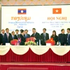 Hội nghị hợp tác phát triển thương mại biên giới Việt Nam-Lào lần thứ XI. (Ảnh: moit.gov.vn)