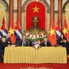 Việt Nam và Cuba ký kết Hiệp định thương mại. (Ảnh: TTXVN)