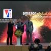 Khởi động chương trình hợp tác giữa Cục Xúc tiến thương mại và Amazon Global Selling. (Ảnh: Đức Duy/Vietnam+)
