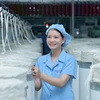 Công nhân dệt may trên dây chuyền sản xuất. (Ảnh: Đức Duy/Vietnam+)