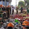 Lực lượng Quản lý thị trường Hà Nội tiến hành tiêu hủy 6 tấn hàng hóa vi phạm. (Ảnh: Đức Duy/Vietnam+)