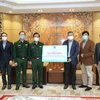 PVN trao hỗ trợ 500 triệu đồng cho Bộ Tư lệnh Bộ đội Biên phòng. (Ảnh: PV/Vietnam+)