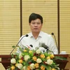 Phó Chủ tịch Ủy ban nhân dân thành phố Hà Nội Ngô Văn Quý chủ trì cuộc họp. (Ảnh: Vietnam+)