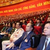 Các đại biểu dự phiên tham luận tại hội trường Trung tâm Hội nghị Quốc gia, sáng 27/1. (Ảnh: TTXVN)