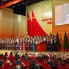 Ban Chấp hành Trung ương Đảng Khóa XIII ra mắt Đại hội. (Ảnh: TTXVN)