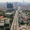 Tuyến đường Ngã Tư Vọng-Ngã Tư Sở góp phần giải quyết các điểm nóng ùn tắc giao thông trên địa bàn thành phố. (Ảnh: TTXVN)