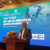 Thứ trưởng Bộ Công Thương Trần Quốc Khánh phát biểu tại hội thảo. (Ảnh: Đức Duy/Vietnam+)