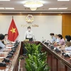 Bộ trưởng Bộ Công Thương Nguyễn Hồng Diên làm việc trực tuyến với Bắc Giang về sản xuất và tiêu thụ nông sản. (Ảnh: PV/Vietnam+)