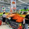 Các siêu thị tăng nguồn cung dự trữ hàng hóa, đảm bảo bình ổn thị trường. (Ảnh: Đức Duy/Vietnam+)