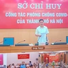Ông Hà Minh Hải, Phó Chủ tịch UBND thành phố Hà Nội họp với các quận, huyện về công tác phòng chống dịch bệnh. (Ảnh: PV/Vietnam+)