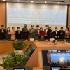 Lễ ký kết Chương trình hợp tác: Đảm bảo an toàn thực phẩm, nâng cao chất lượng nông, lâm, thủy sản giao thương giữa Hà Nội và các tỉnh, thành phố giai đoạn 2021- 2025. (Ảnh: Xuân Quảng/Vietnam+)