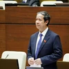 Bộ trưởng Bộ Giáo dục và Đào tạo Nguyễn Kim Sơn trả lời chất vấn. (Ảnh: Phương Hoa/TTXVN)