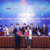 Đại diện Cục Thương mại Điện tử và Kinh tế số cùng các doanh nghiệp tại buổi họp công bố chương trình “Gian hàng quốc gia Việt Nam” trên sàn thương mại điện tử JD.com. (Ảnh: Đức Duy/Vietnam+)