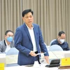 Thứ trưởng Bộ Giao thông vận tải Nguyễn Ngọc Đông tại Phiên họp báo Chính phủ tối 28/1. (Ảnh: Minh Đức/TTXVN)