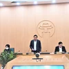 Phó Bí thư Thành ủy Hà Nội Nguyễn Văn Phong phát biểu tại cuộc họp của Ban Chỉ đạo phòng, chống dịch COVID-19 thành phố với các quận, huyện. (Ảnh: PV/Vietnam+)