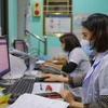 Trạm Y tế phường Quan Hoa, quận Cầu Giấy ứng dụng hiệu quả các phần mềm hỗ trợ F0. (Ảnh: Minh Sơn/Vietnam+)