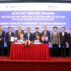 Lễ ký kết Thỏa ước tín dụng giữa AFD và EVN cho Dự án lưới điện phân phối miền Nam. (Ảnh: PV/Vietnam+)