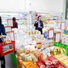Người dân mua sắm tại siêu thị Hapro Khâm Thiên, Hà Nội. (Ảnh: Trần Việt/TTXVN)