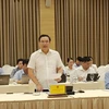 Thứ trưởng Bộ Lao động, Thương binh và Xã hội thông tin tại phiên họp báo Chính phủ tối 4/7. (Ảnh: PV/Vietnam+)
