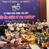 Phóng viên Thông tấn xã Việt Nam giành 2 giải Khuyến khích Cuộc thi viết "Dấu ấn Quản lý thị trường." (Ảnh: Đức Duy/Vietnam+)