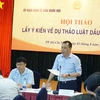 Thứ trưởng Bộ Công Thương Đặng Hoàng An trao đổi về phân cấp, phân quyền trong Luật Dầu khí (sửa đổi). (Ảnh: PV/Vietnam+)