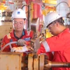Người lao động Dầu khí trên các công trình biển. (Ảnh: PV/Vietnam+)