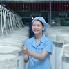 Doanh nghiệp dệt may áp dụng công nghệ mới để tăng năng suất lao động. (Ảnh: PV/Vietnam+)