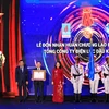 Tại Lễ Kỷ niệm 15 năm thành lập, PV Power vinh dự được Chủ tịch nước trao tặng Huân chương lao động hạng Nhì. (Ảnh: Xuân Quảng/Vietnam+)