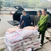 Lực lượng liên ngành tạm giữ gần 1 tấn nầm lợn trên địa bàn quận Hoàn Kiếm. (Ảnh: PV/Vietnam+)