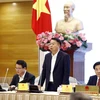 Thứ trưởng Bộ Tài chính Nguyễn Đức Chi thông tin tại phiên họp báo Chính phủ về quản lý trái phiếu riêng lẻ. (Ảnh: Xuân Quảng/Vietnam+)