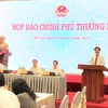 Bộ trưởng Chủ nhiệm Văn phòng Chính phủ Trần Văn Sơn thông tin về tình hình kinh tế-xã hội 7 tháng. (Ảnh: Đức Duy/Vietnam+)